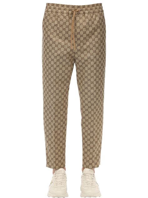 gucci beige pants sales men|gucci leather bottoms for men.